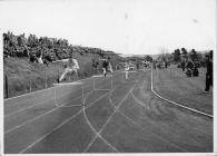 Hurdle race, UCW Aber Penglais running track, 1953