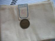 Midwife badge and button used on baby belly button