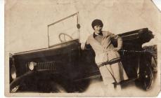 Photograph of Catherine Ann Hughes with car