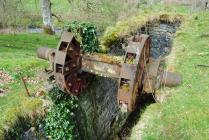 Metal axle of waterwheel at Bron Floyd Mine