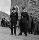 Two policemen outside the Calvinistic Methodist...