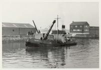 The dredger Seiont II working in Caernarfon...