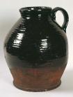 Jug with black glaze, made in Buckley (19th...