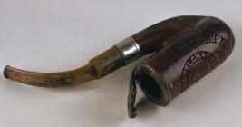 Carved tobacco pipe used during the Boer War,...