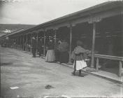 Stalls at Carmarthen Market, c. 1900