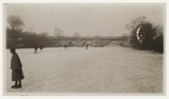 View of the bridge over the frozen river Taff,...