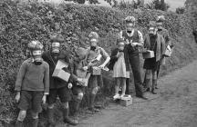 Children wearing their gas masks, 1939