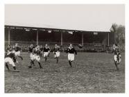 Jack Matthews delivers a pass to Malcolm Thomas...