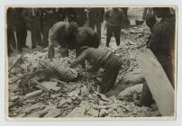 Searching the rubble for survivors after an...