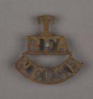 Badge of the Welsh Regiment belonging to Bryn...