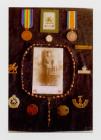 Collection of medals and badges worn by William...