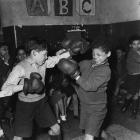 Two boys boxing in Butetown