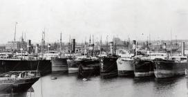 Barry docks, c.1910, with ships moored to buoys...