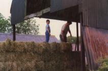 Organising the bales in the barn