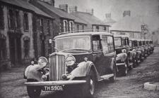 Row of cars, Castle Garage, Loughor, c.1950