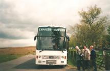 Men boarding bus