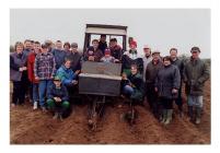 Members and parents of Bryngwyn Y.F.C. sowing...