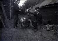 Three men drinking milk