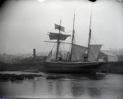 A sailing ship at Carmarthen in about 1900,...