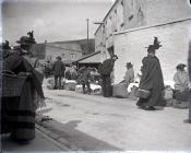 Cockle sellers outside Carmarthen Market.  c. 1900