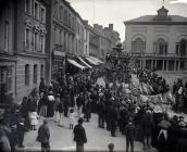 A circus parade in Guildhall Square, Carmarthen