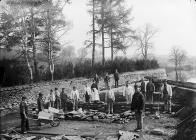 Workers at the weir, Necastle Emlyn