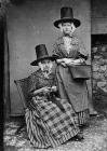 Two women in national dress (Mrs Roberts)