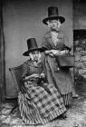 Two women in national dress (Mrs Roberts)