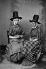 Two women in national dress (Whitaker)