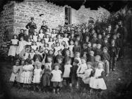 group of children and young persons (a choir?)