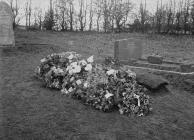 Grave with funeral flowers