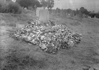 Grave with funeral flowers