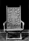 Chair with ornately carved decoration