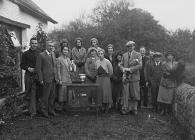 Group of people with a golfing trophy