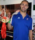 The swimmer David Roberts with his medals