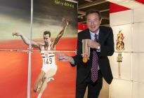 Lyn Davies with his medals and painting at...