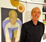 The cyclist Simon Richardson with a painting of...