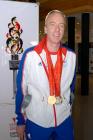 The cyclist Simon Richardson with his medals 