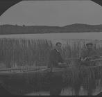 Two unknown men in a boat, circa 1930s
