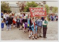 School children with flags and banners