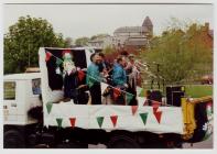 Band in back of truck at event