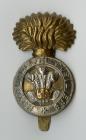 Royal Welsh Fusiliers cap badge belonging to...