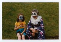 Miss Ray Charles in a clown costume at the...