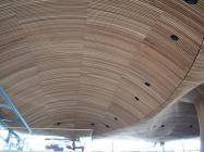 Welsh Assembly - coved convex section of timber...