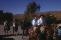 Young people riding in the old Spanish way -...