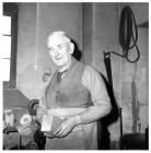 George Scammell in his workshop at Union Road,...