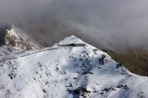 Snowdon summit under snow, showing railway...