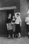 Workers outside Andomac maesteg.  Ros Catton in...