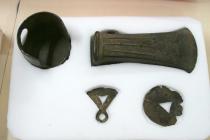 Chariot Wheel cap, axe head and two razors Iron...