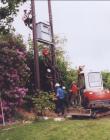 The 14 metre poles are placed into position.